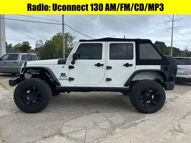 used 2014 Jeep Wrangler Unlimited car, priced at $18,775