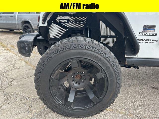 used 2014 Jeep Wrangler Unlimited car, priced at $18,775