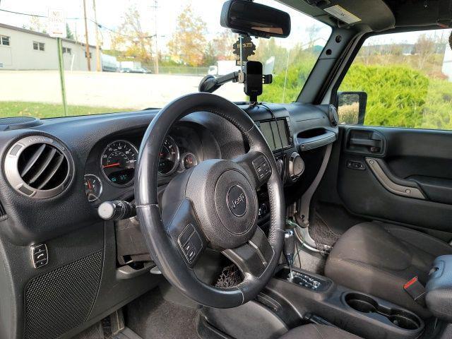 used 2015 Jeep Wrangler car, priced at $16,125