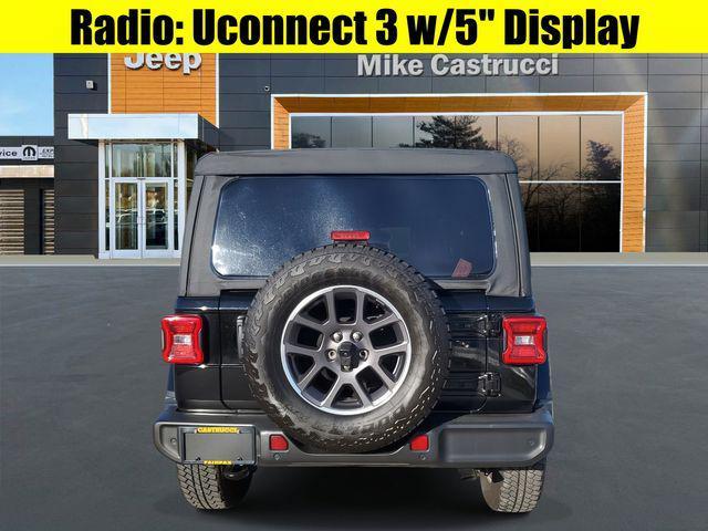 used 2021 Jeep Wrangler Unlimited car, priced at $33,978