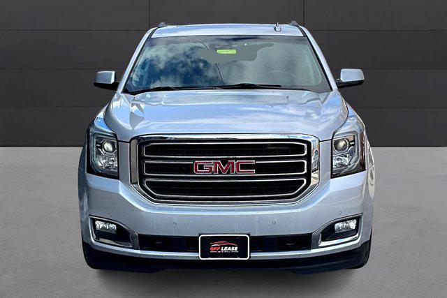 used 2015 GMC Yukon car, priced at $19,500