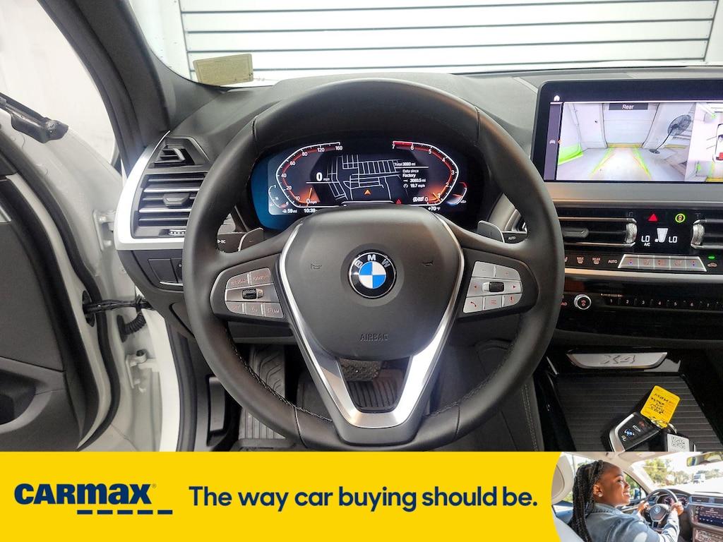 used 2025 BMW X4 car, priced at $51,998