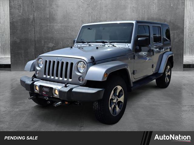 used 2016 Jeep Wrangler Unlimited car, priced at $24,491