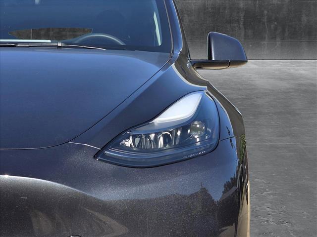 used 2025 Tesla Model Y car, priced at $36,890