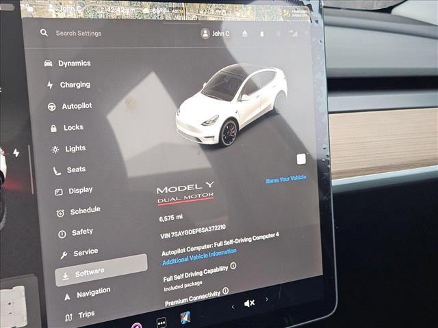used 2025 Tesla Model Y car, priced at $41,889