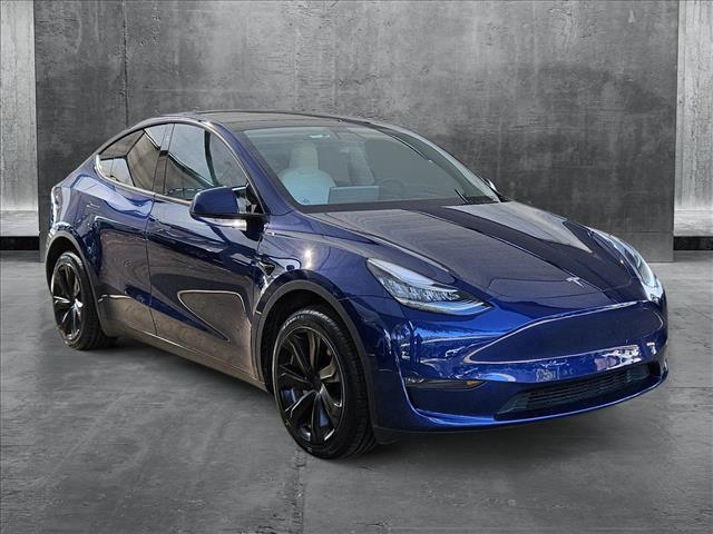 used 2023 Tesla Model Y car, priced at $34,890