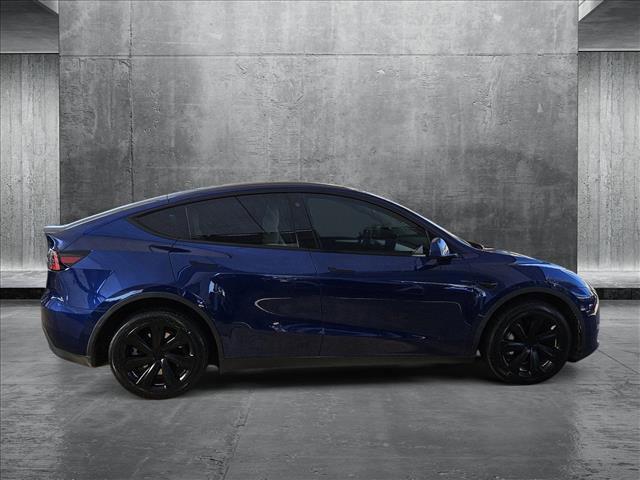 used 2023 Tesla Model Y car, priced at $34,890