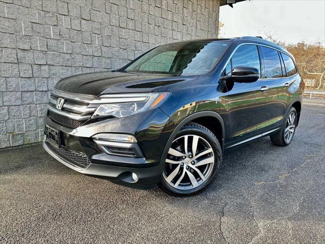 used 2016 Honda Pilot car, priced at $16,999