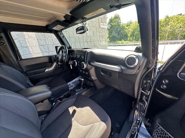 used 2014 Jeep Wrangler Unlimited car, priced at $15,499