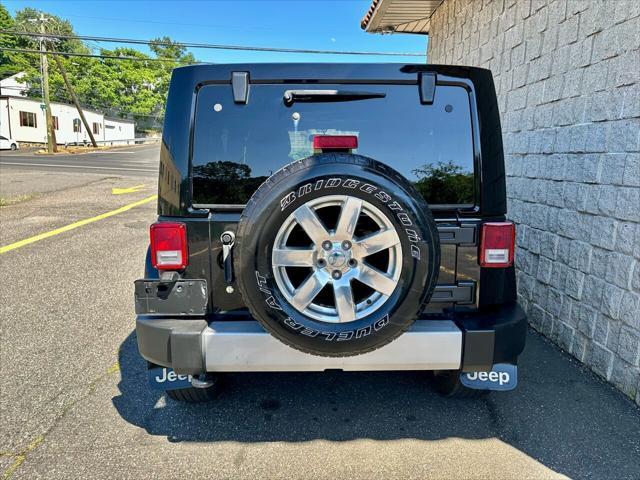 used 2014 Jeep Wrangler Unlimited car, priced at $15,499