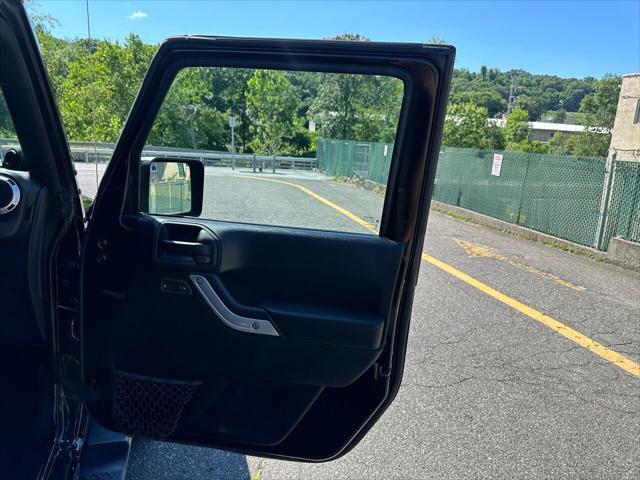 used 2014 Jeep Wrangler Unlimited car, priced at $15,499