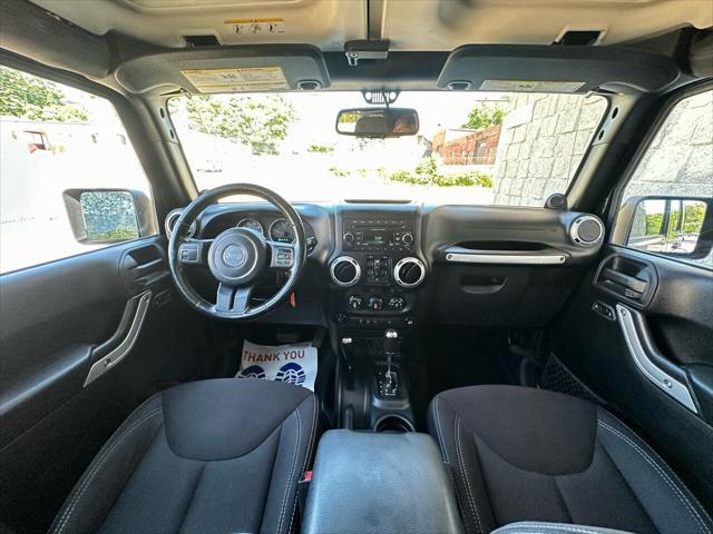 used 2014 Jeep Wrangler Unlimited car, priced at $15,499