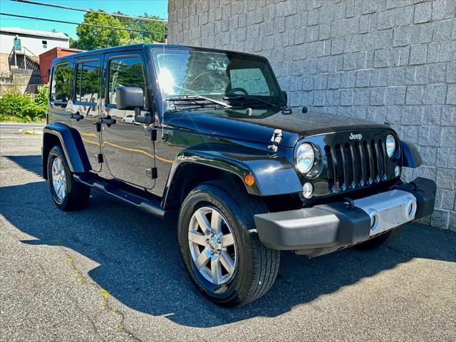 used 2014 Jeep Wrangler Unlimited car, priced at $15,499