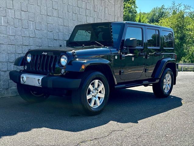 used 2014 Jeep Wrangler Unlimited car, priced at $15,499