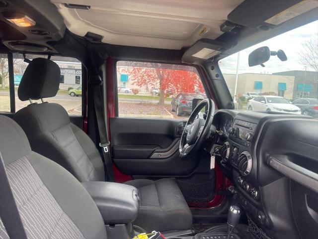 used 2011 Jeep Wrangler Unlimited car, priced at $16,995