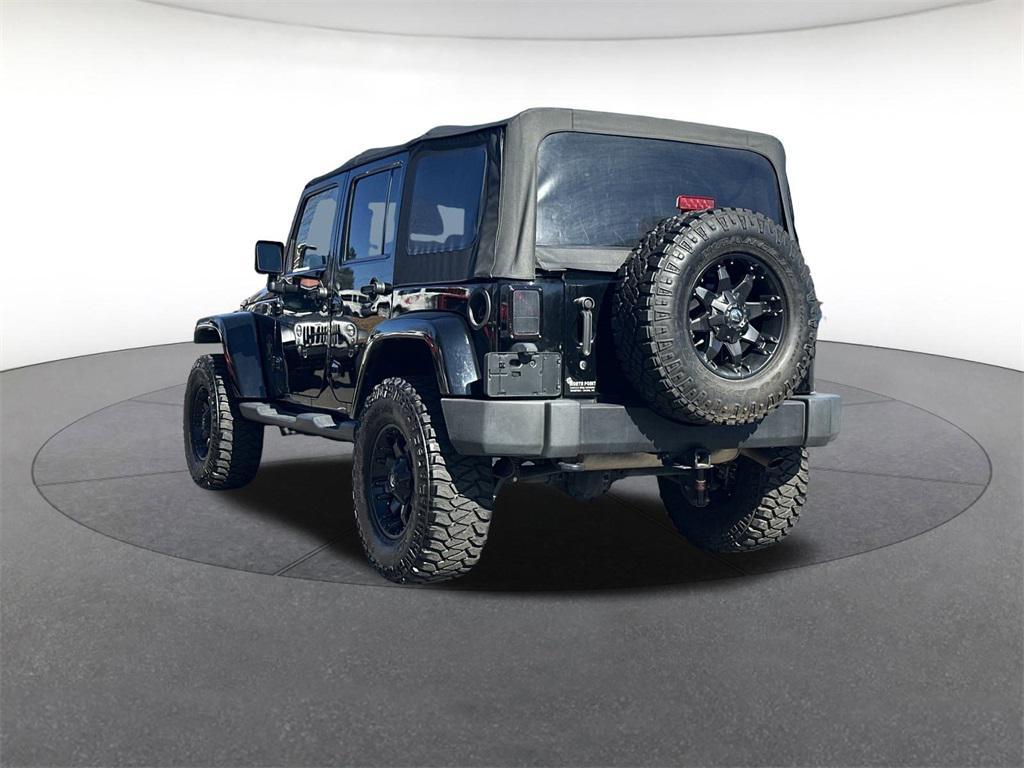 used 2013 Jeep Wrangler Unlimited car, priced at $18,894
