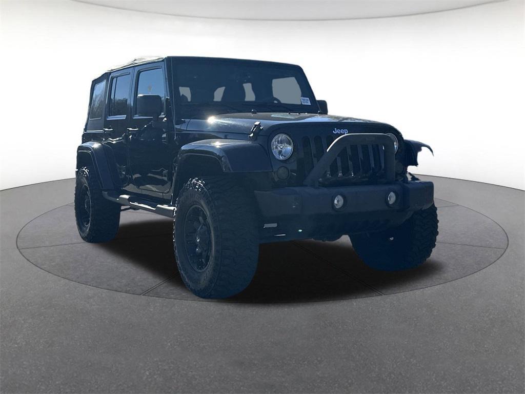 used 2013 Jeep Wrangler Unlimited car, priced at $18,894