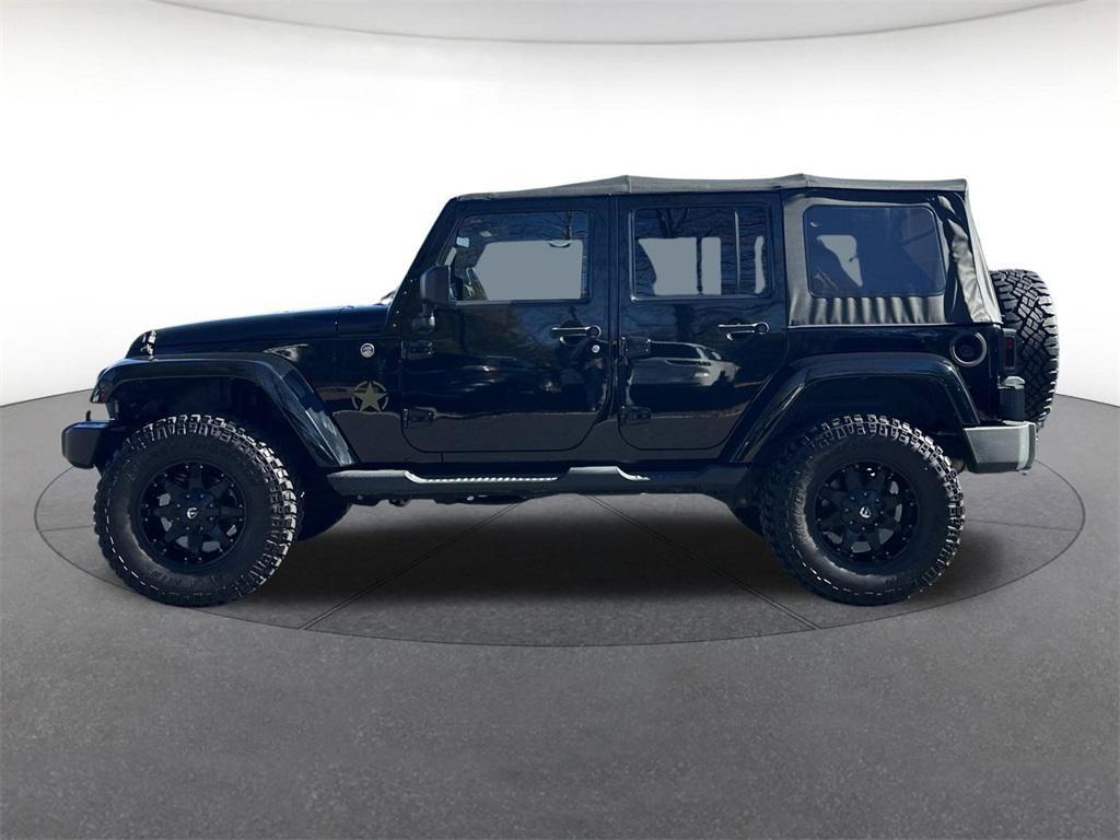used 2013 Jeep Wrangler Unlimited car, priced at $18,894