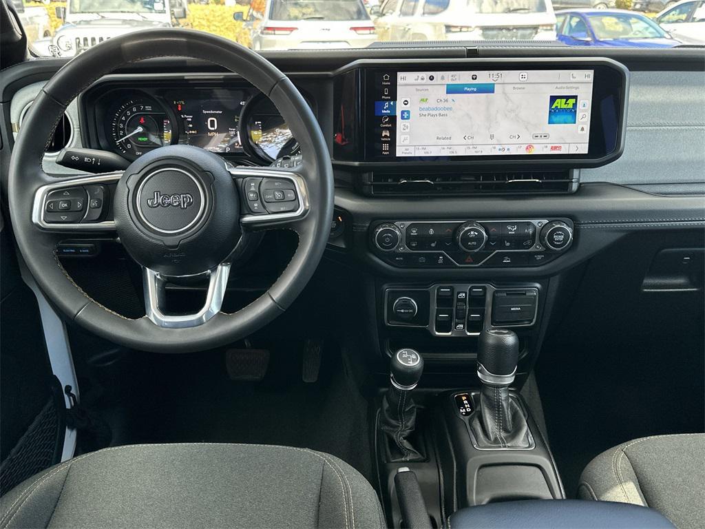 used 2024 Jeep Wrangler 4xe car, priced at $32,939