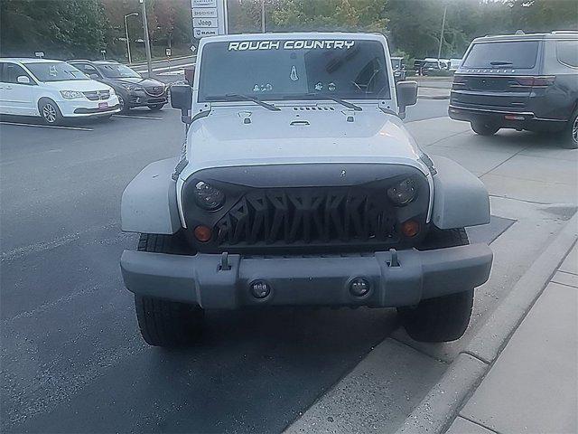 used 2011 Jeep Wrangler Unlimited car, priced at $12,956