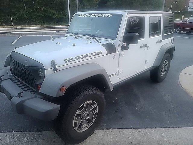 used 2011 Jeep Wrangler Unlimited car, priced at $12,956