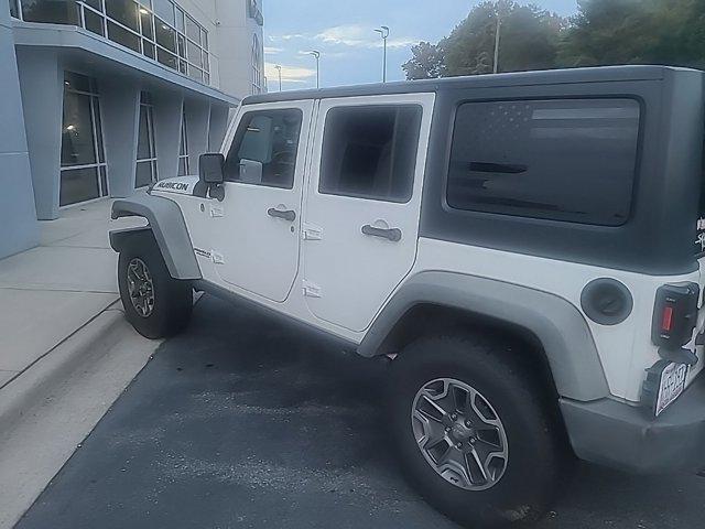 used 2011 Jeep Wrangler Unlimited car, priced at $12,956