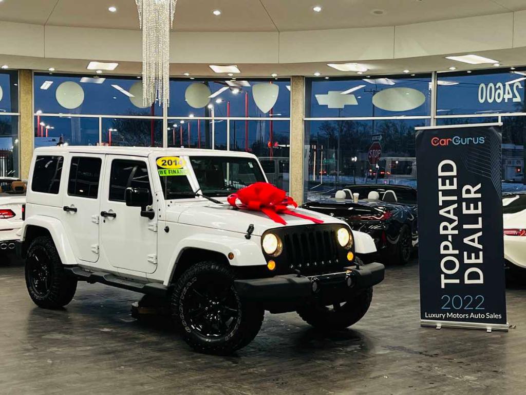 used 2014 Jeep Wrangler Unlimited car, priced at $15,299