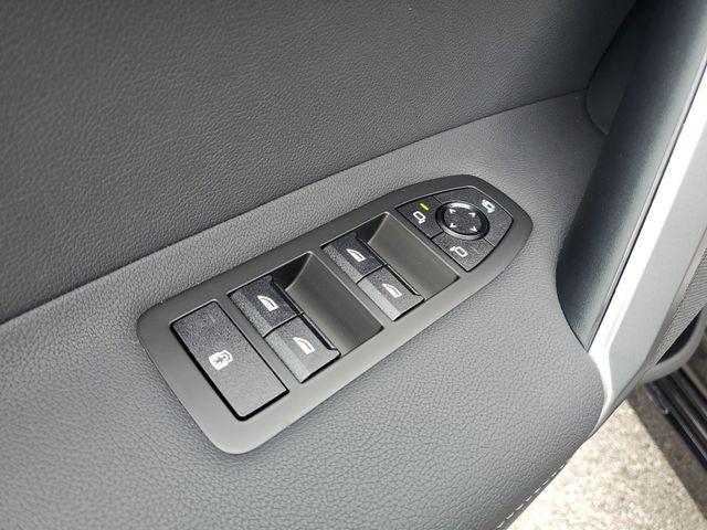 new 2026 BMW iX car, priced at $88,145