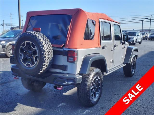 used 2015 Jeep Wrangler Unlimited car, priced at $17,892