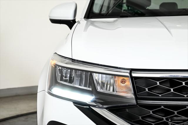 used 2023 Volkswagen Taos car, priced at $22,444