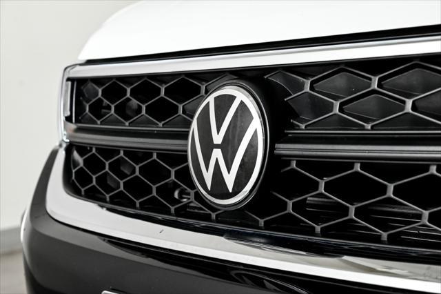 used 2023 Volkswagen Taos car, priced at $22,444