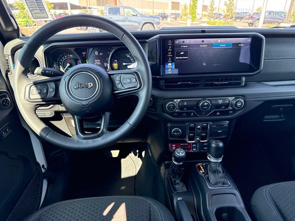 used 2024 Jeep Wrangler 4xe car, priced at $36,780