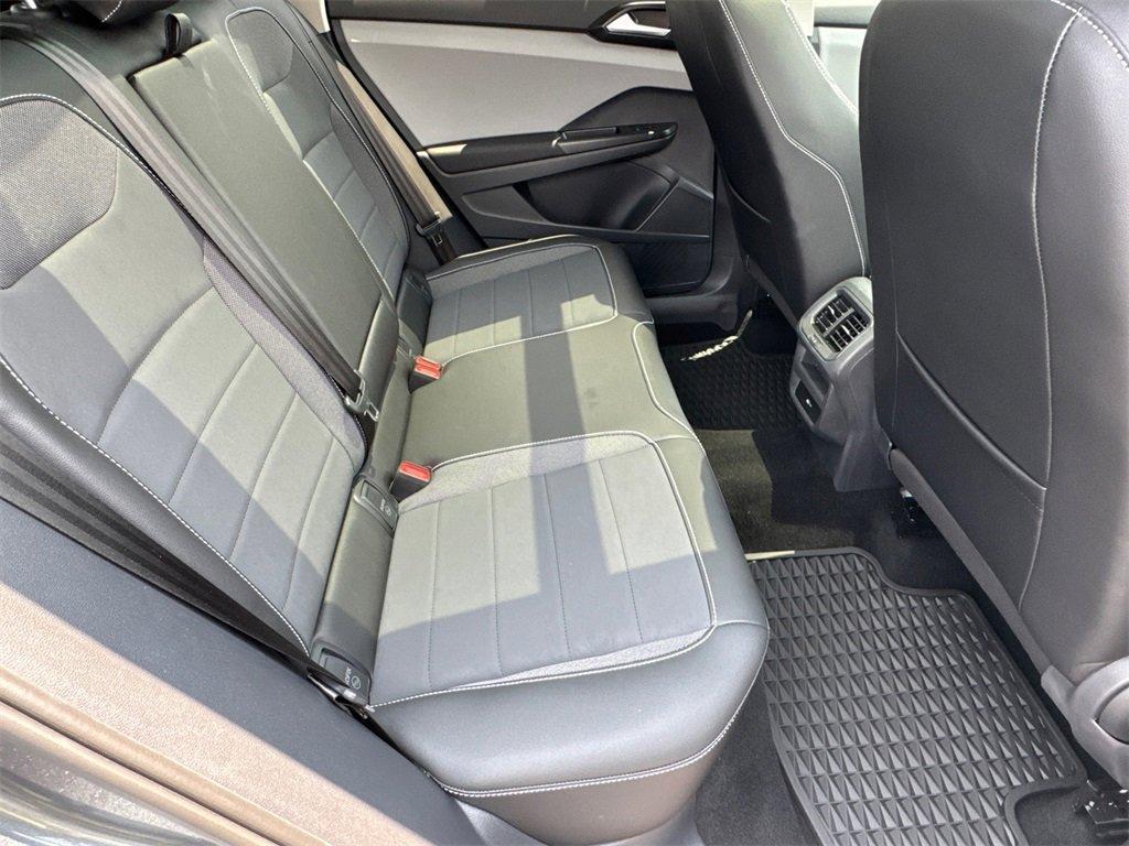 used 2023 Volkswagen Taos car, priced at $24,384