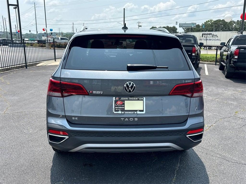 used 2023 Volkswagen Taos car, priced at $24,384