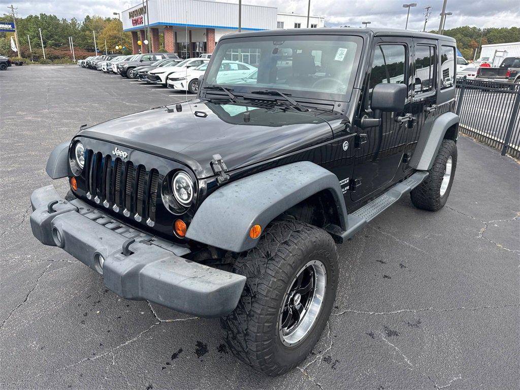 used 2013 Jeep Wrangler Unlimited car, priced at $14,314