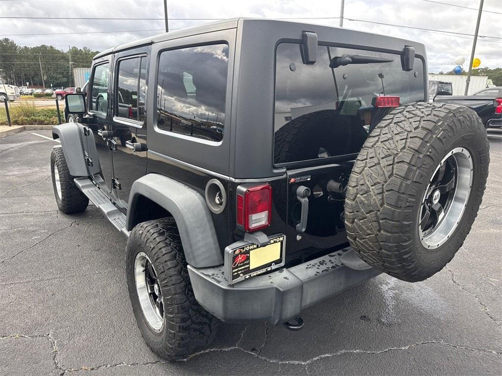 used 2013 Jeep Wrangler Unlimited car, priced at $14,314