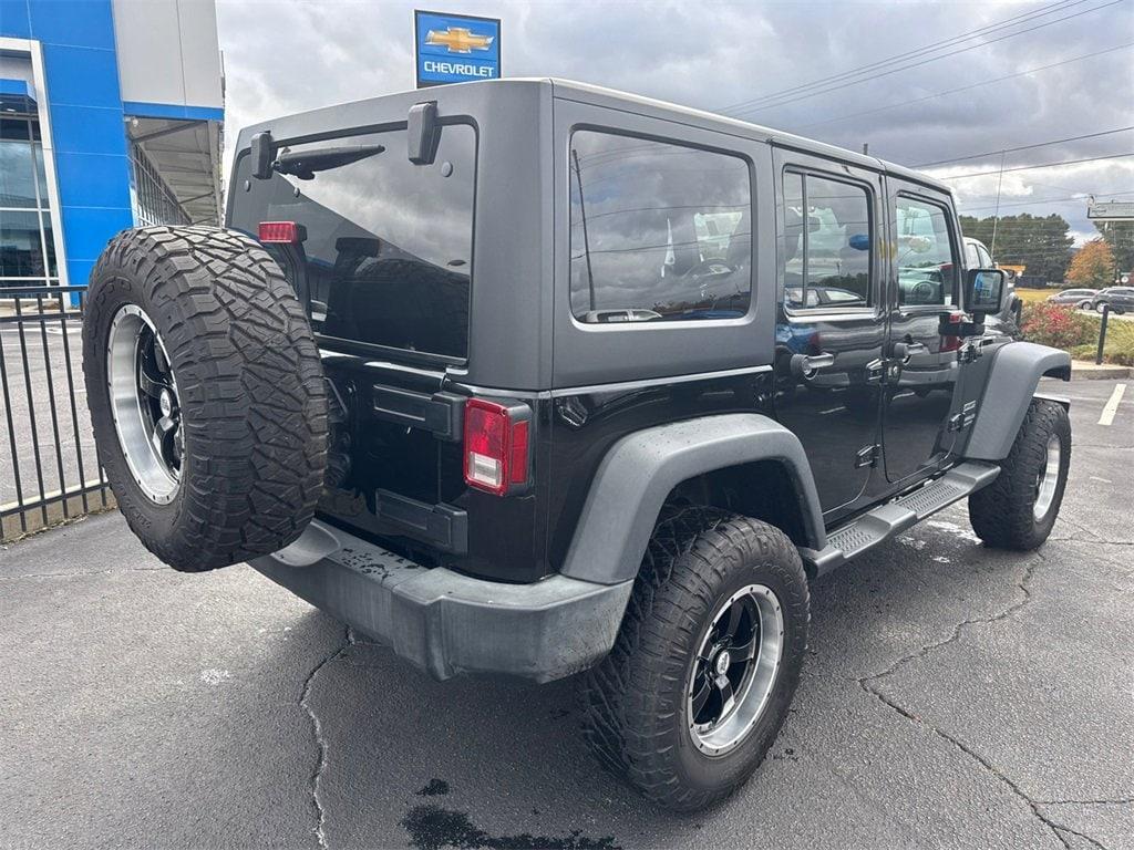 used 2013 Jeep Wrangler Unlimited car, priced at $14,314