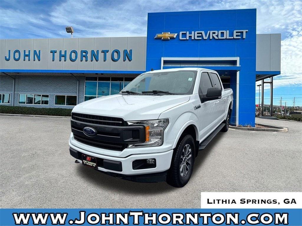 used 2019 Ford F-150 car, priced at $27,214