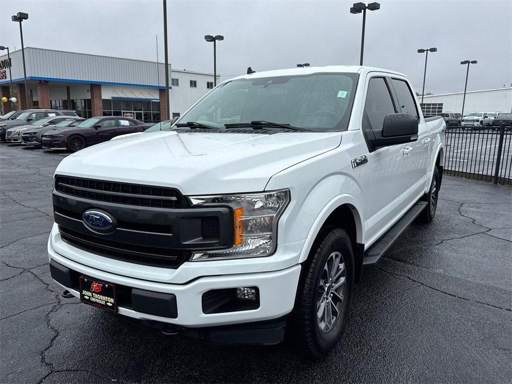 used 2019 Ford F-150 car, priced at $27,214