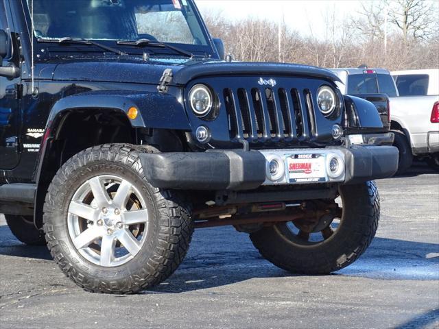 used 2014 Jeep Wrangler Unlimited car, priced at $18,900