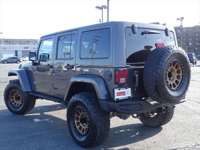 used 2018 Jeep Wrangler JK Unlimited car, priced at $24,359