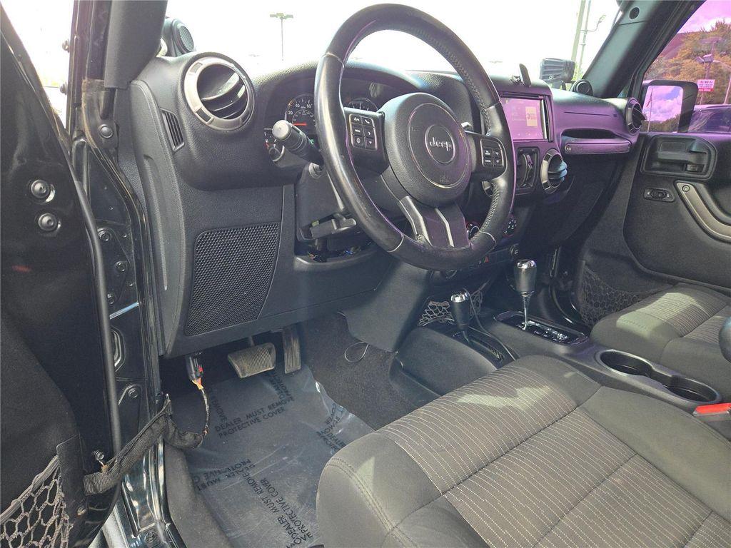 used 2012 Jeep Wrangler Unlimited car, priced at $15,900