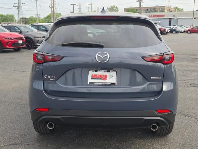 used 2023 Mazda CX-5 car, priced at $32,000