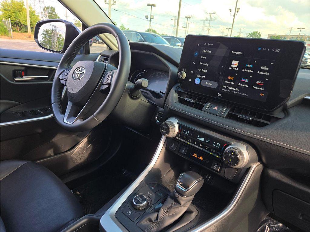 used 2023 Toyota RAV4 Hybrid car, priced at $35,000