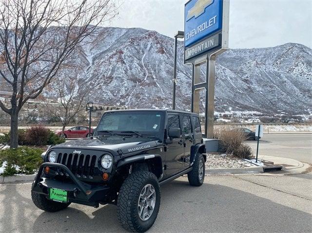 used 2013 Jeep Wrangler Unlimited car, priced at $19,510