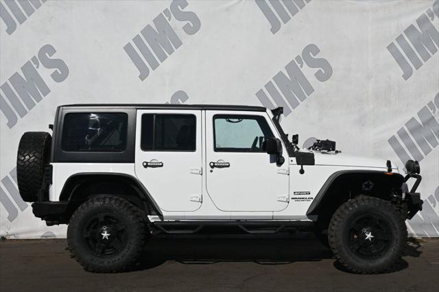 used 2015 Jeep Wrangler Unlimited car, priced at $23,995