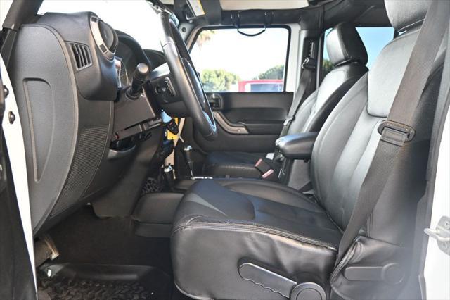 used 2015 Jeep Wrangler Unlimited car, priced at $23,995