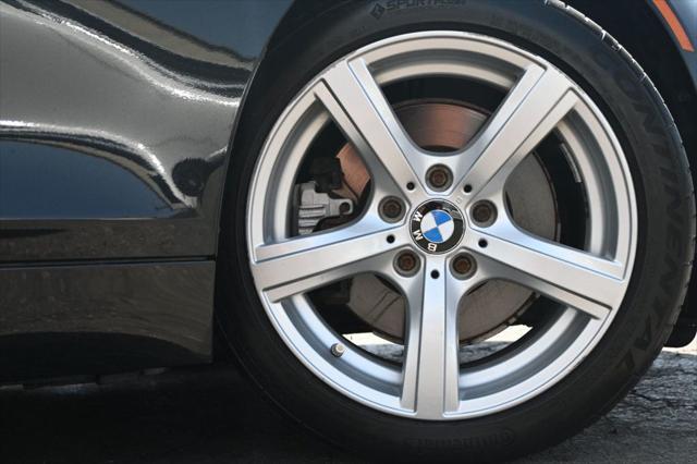 used 2013 BMW Z4 car, priced at $17,995