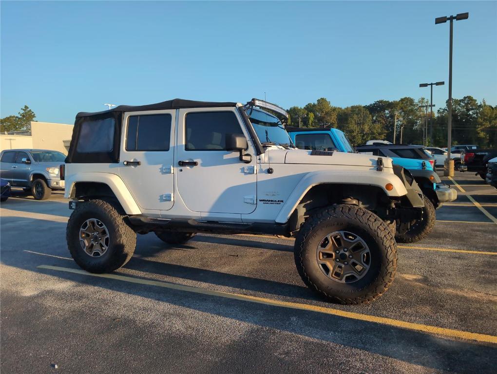 used 2010 Jeep Wrangler Unlimited car, priced at $13,550