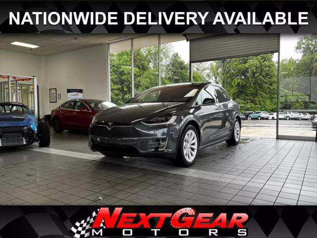 used 2018 Tesla Model X car, priced at $33,990